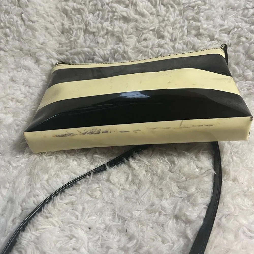 Kate Spade patent Black and Cream Striped small Crossbody Bag.